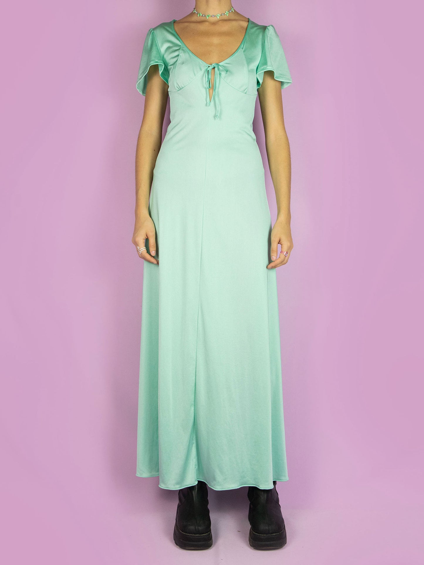 The Vintage 90s Tie Slip Maxi Dress is a romantic flowy light pastel turquoise short-sleeved midi night dress that ties at the front.