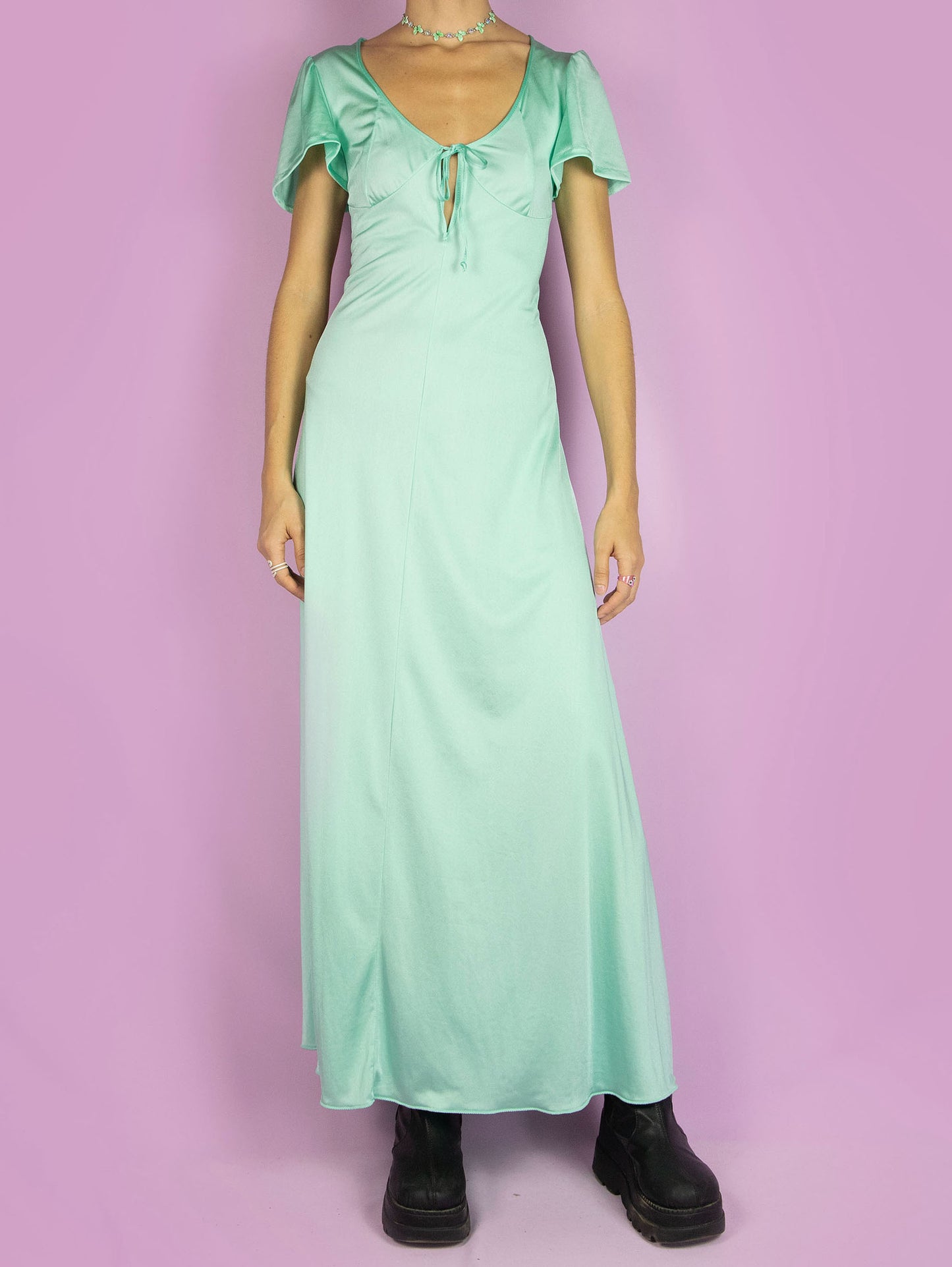 The Vintage 90s Tie Slip Maxi Dress is a romantic flowy light pastel turquoise short-sleeved midi night dress that ties at the front.