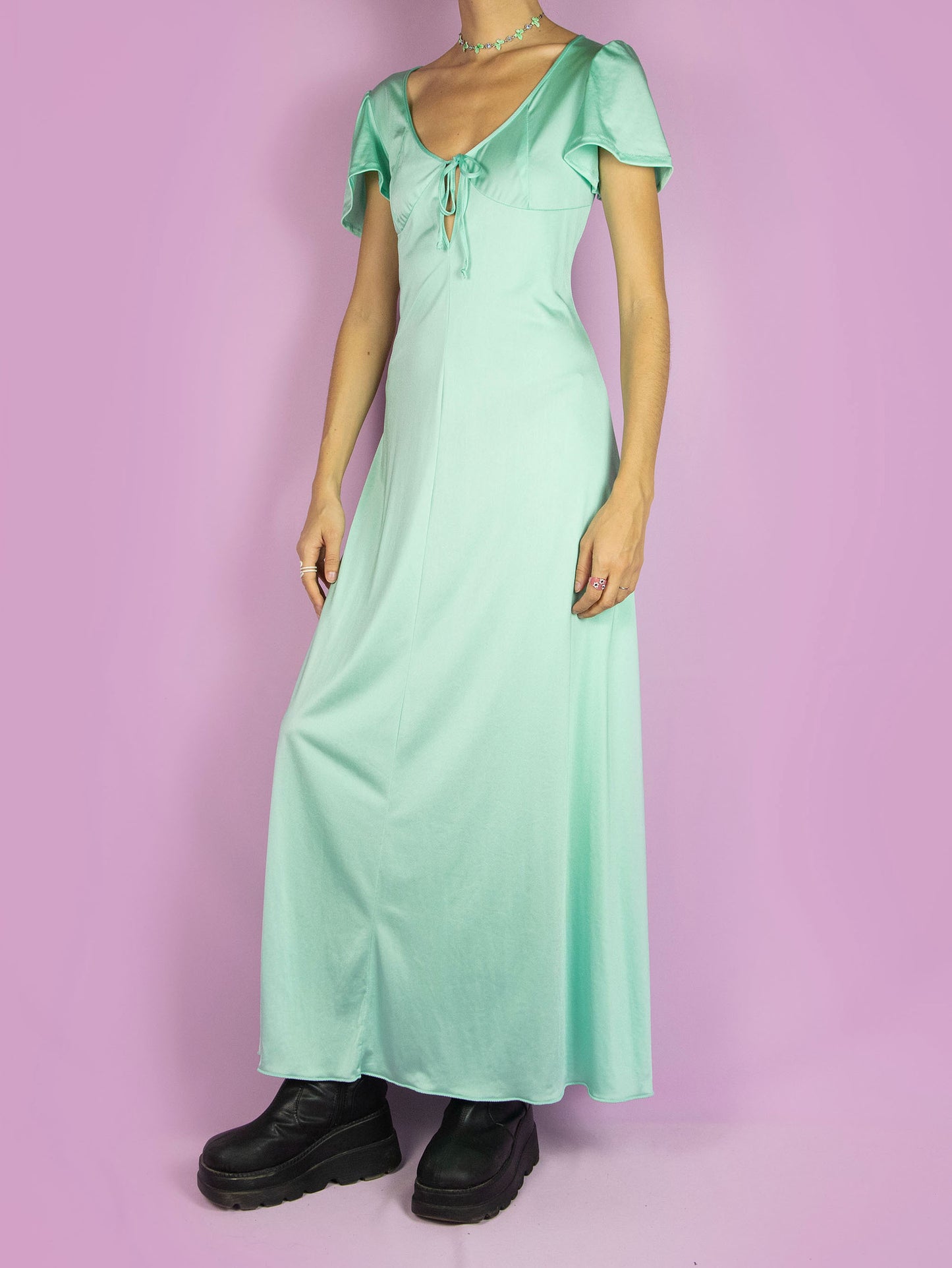 The Vintage 90s Tie Slip Maxi Dress is a romantic flowy light pastel turquoise short-sleeved midi night dress that ties at the front.
