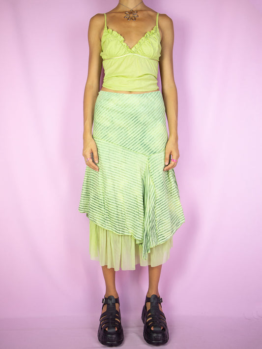The Y2K Asymmetrical Layered Midi Skirt is a vintage 2000s cyber fairy festival party style green striped print skirt with pointed asymmetric layers, semi-sheer mesh hem and elastic waist.
