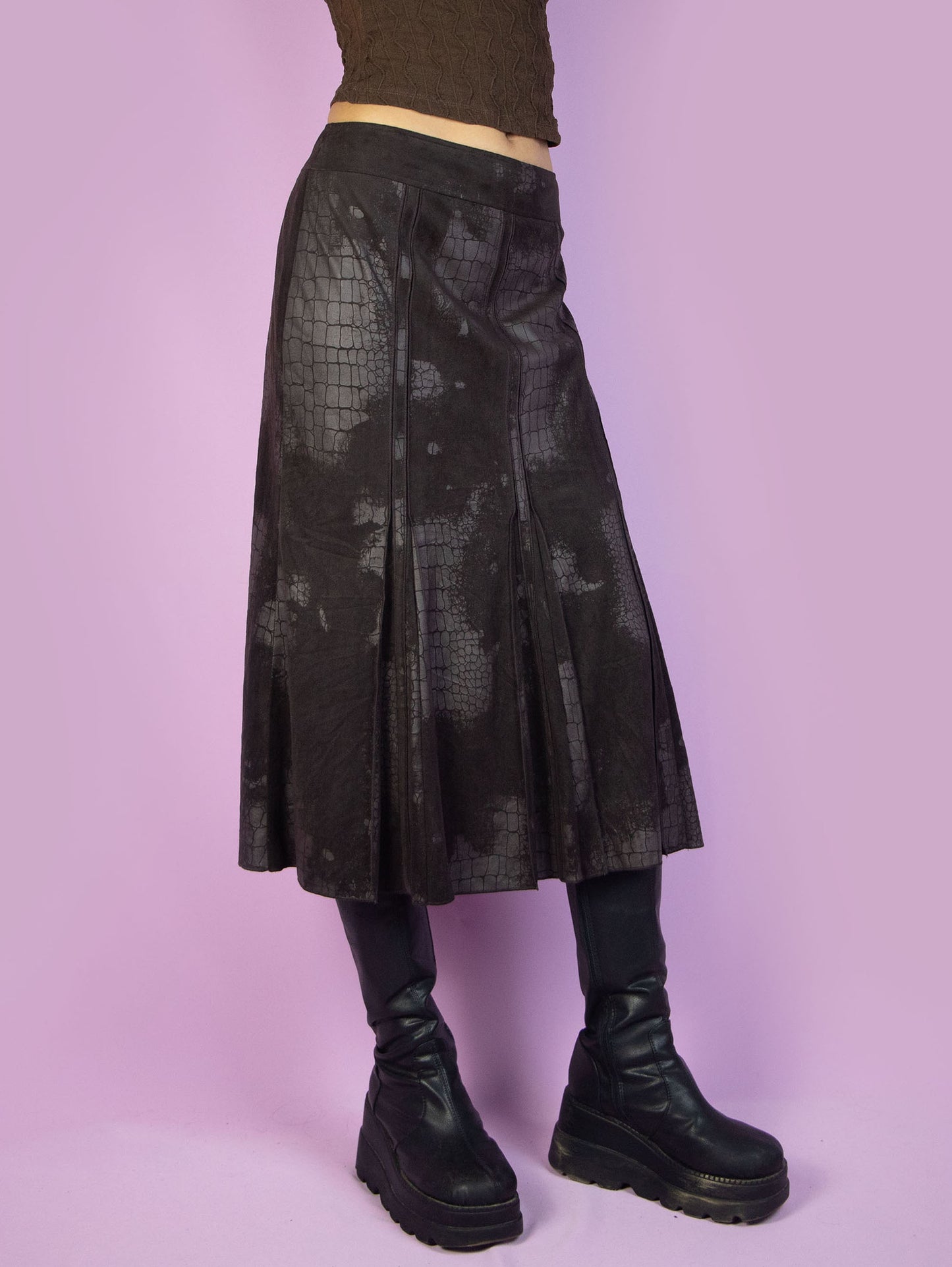 The Y2K Dark Brown Midi Skirt is a vintage 2000s elegant minimalist faux suede animal print pattern trumpet maxi skirt with a side zipper closure. Excellent vintage condition.