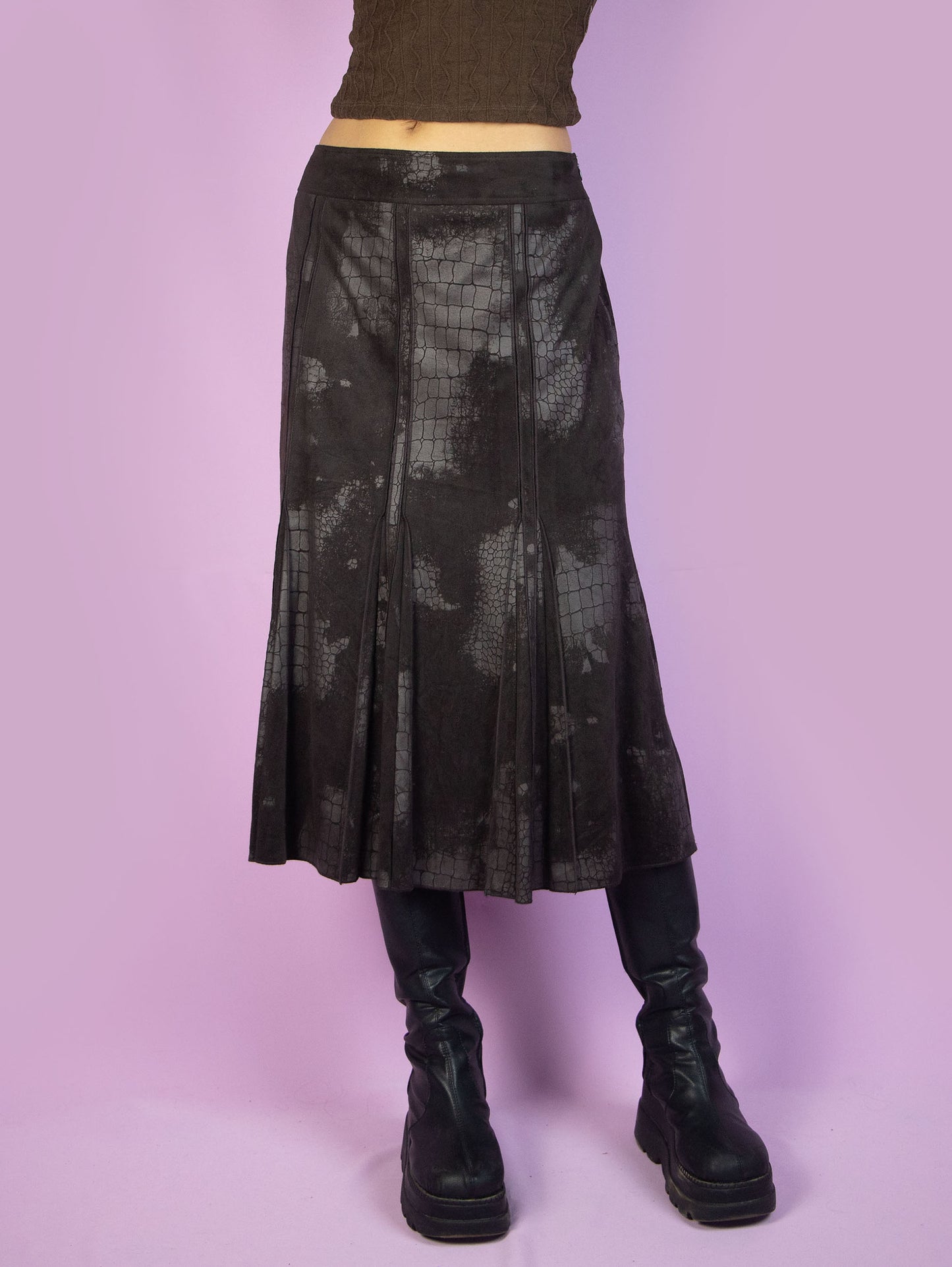 The Y2K Dark Brown Midi Skirt is a vintage 2000s elegant minimalist faux suede animal print pattern trumpet maxi skirt with a side zipper closure. Excellent vintage condition.