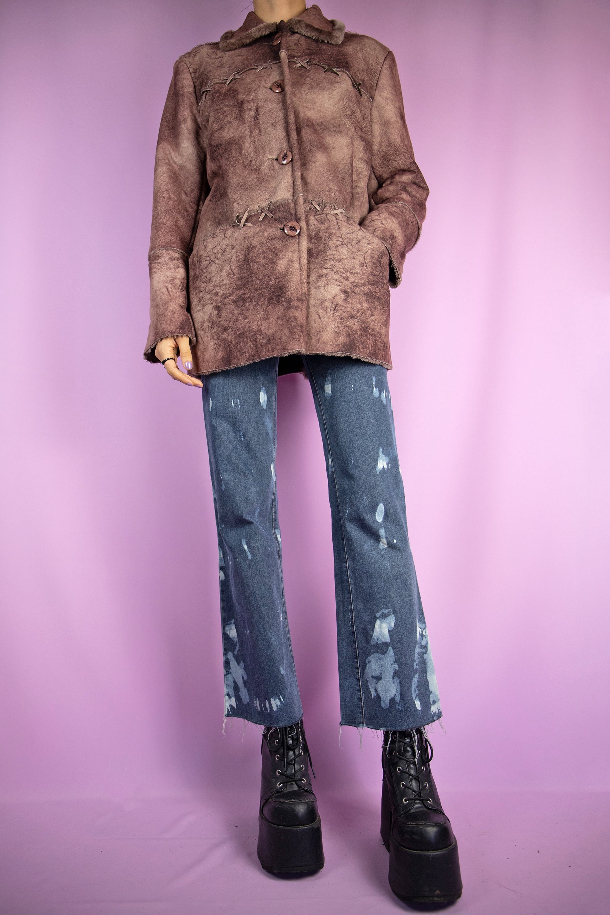 The Y2K Printed Faux Fur Jacket is a vintage 2000s winter brown abstract tie-dye pattern statement coat with a collar, pockets, and buttons.