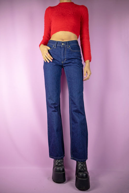The Vintage 90s Mid Rise Bootcut Jeans are mid-rise straight-leg pants with pockets. Classic retro 1990s casual denim trousers.