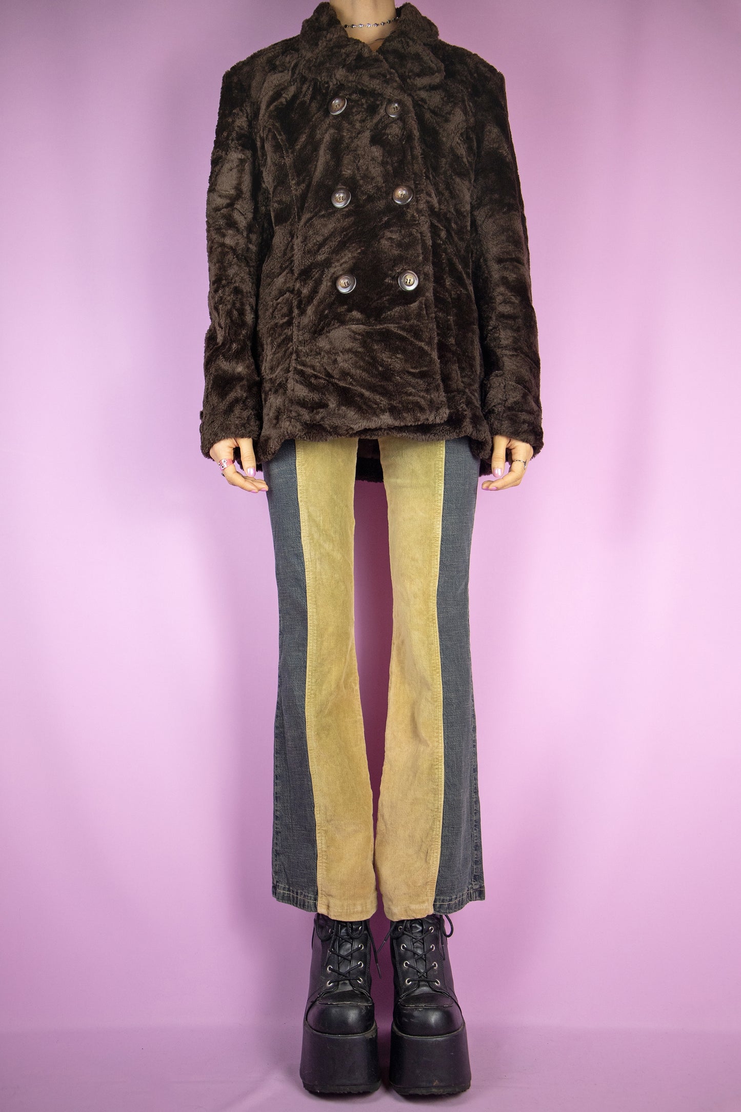 The Vintage 90s Brown Faux Fur Jacket is a dark brown faux fur jacket with button closure and pockets. Casual classic retro blazer style 1990s winter coat.