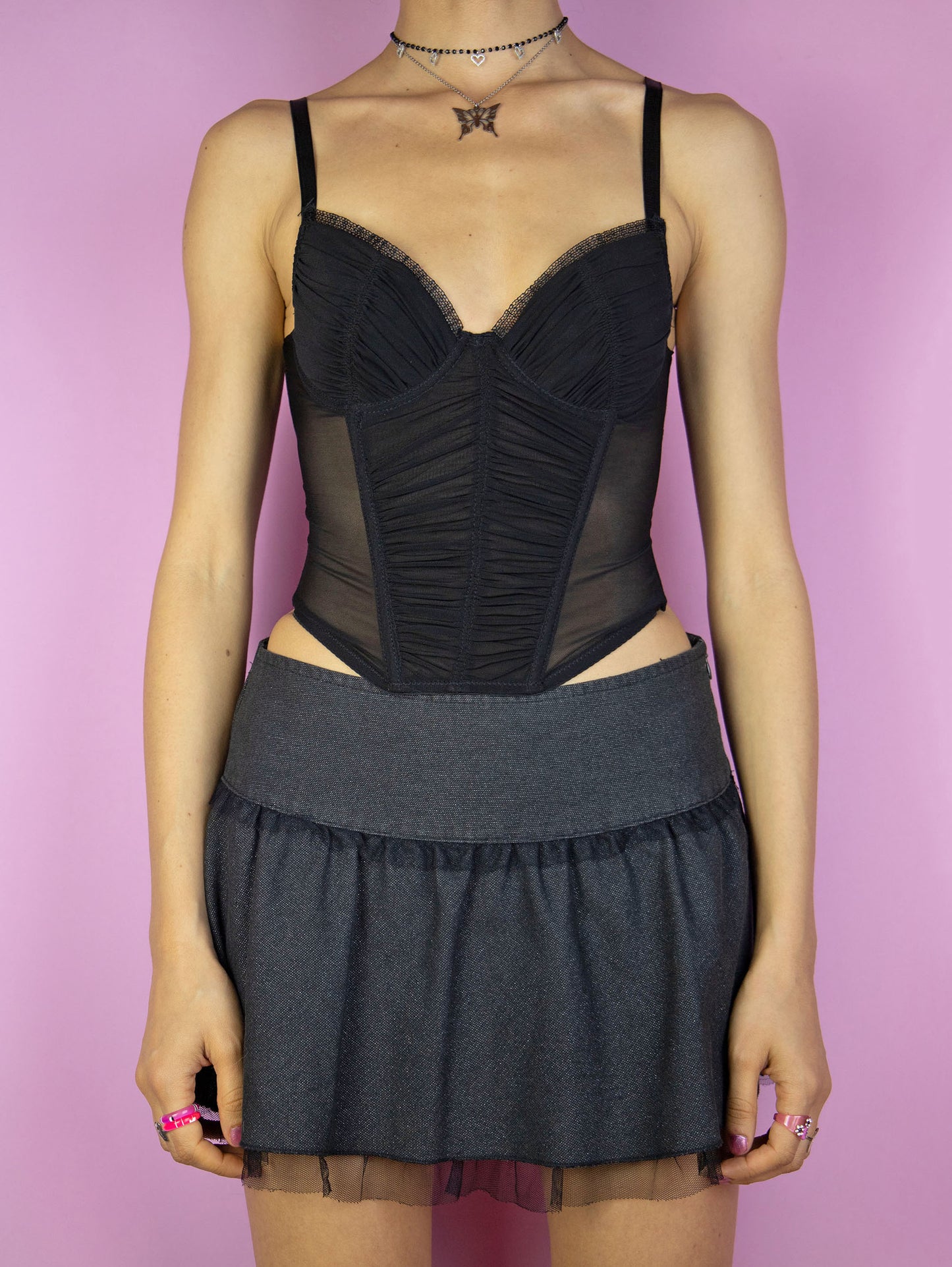 The Y2K Black Mesh Corset Top is a vintage 2000s party night out style semi-sheer ruched lingerie bustier with adjustable straps and back hook closure.