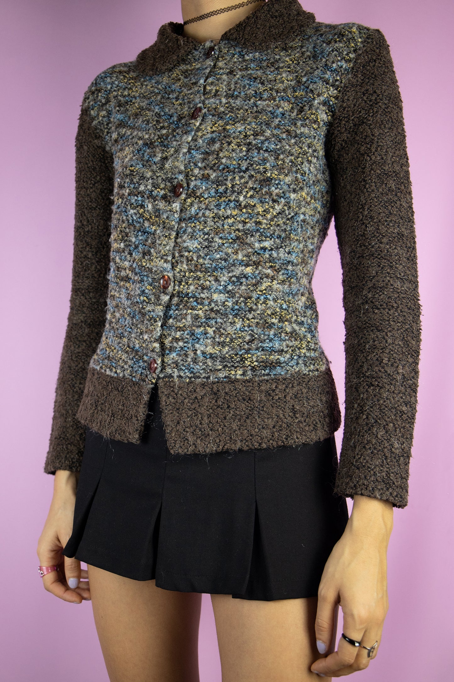 The Vintage 90s Fairy Grunge Brown Cardigan is a dark brown, beige and blue wool blend cardigan with a collar and buttons. Boho 1990s knit sweater.