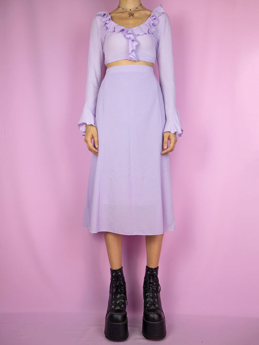 The Y2K Purple Trumpet Midi Skirt is a vintage 2000s boho summer pastel light lilac skirt with side zipper closure.