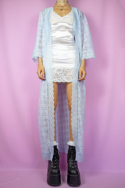 The Vintage 80's Blue Lace Duster Coat is a pastel light blue floral lace three-quarter sleeve robe, creating a stunning boho fairy romantic lingerie flowy peignoir from the 1980s.