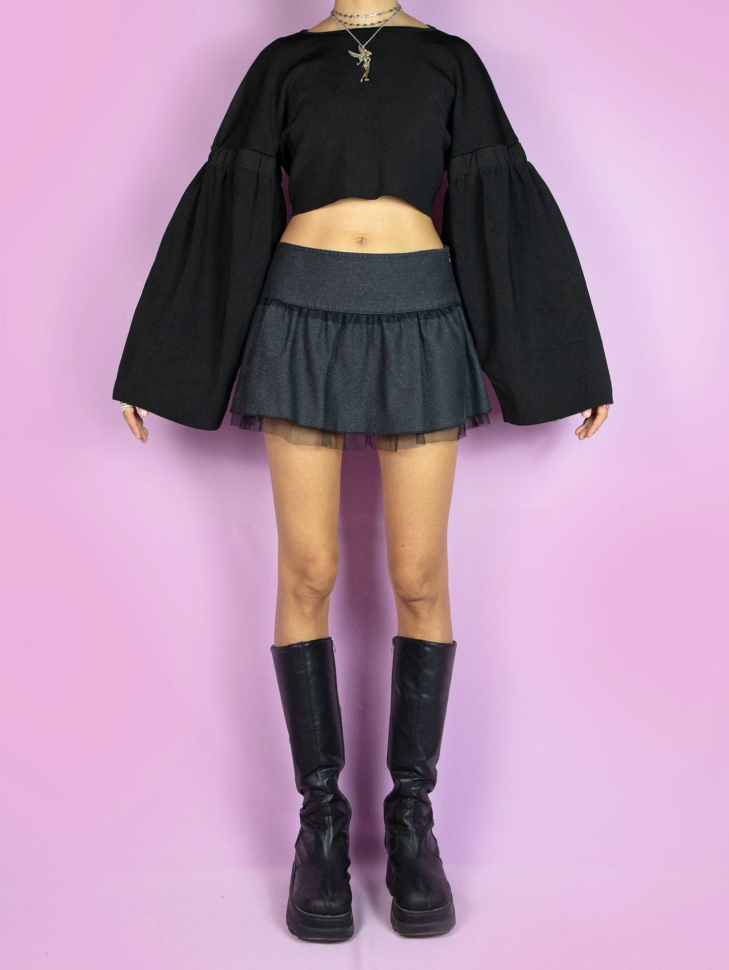 The Y2K Black Wide Sleeve Sweater is a vintage cropped black top with extra-wide long sleeves. Cyber goth 2000s subversive top.