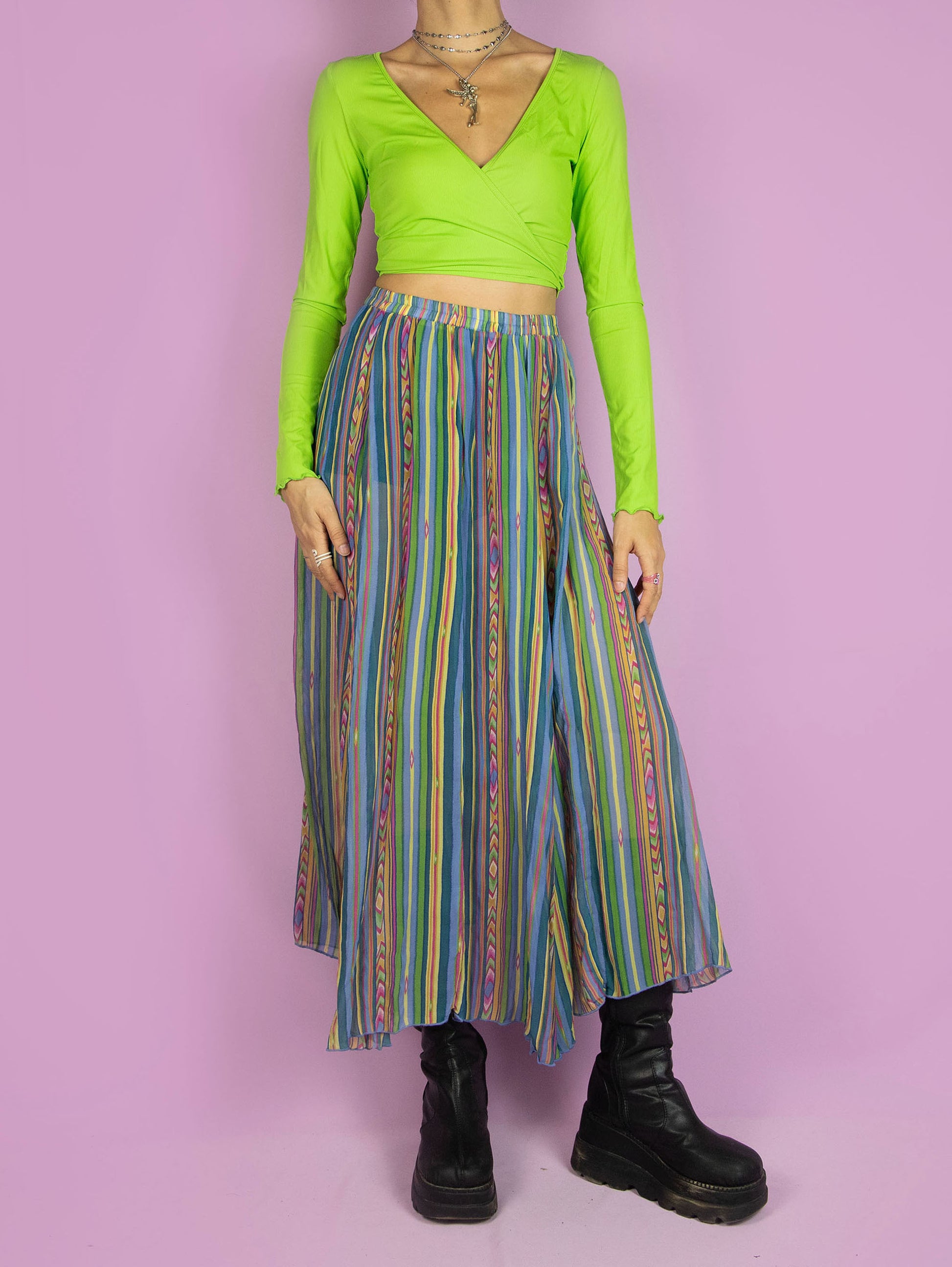 The Vintage 90s Boho Sheer Midi Skirt is a semi-transparent multicolored striped silk skirt with an elastic waistband. Summer beach 1990s flowy cover-up maxi skirt.