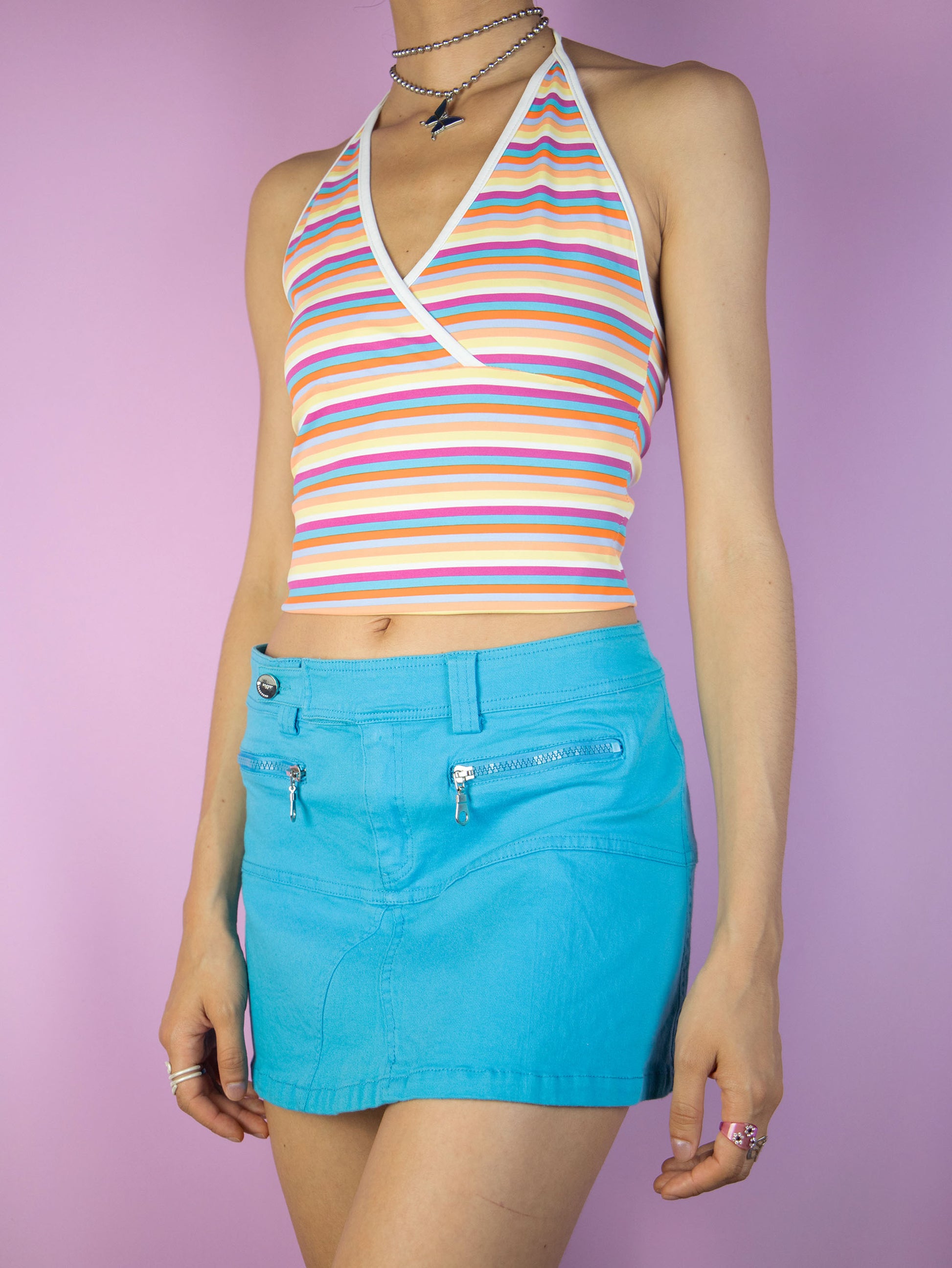 The Y2K Blue Low Rise Mini Skirt is a vintage low waisted blue elasticated skirt. Cyber grunge 2000s summer mini skirt.