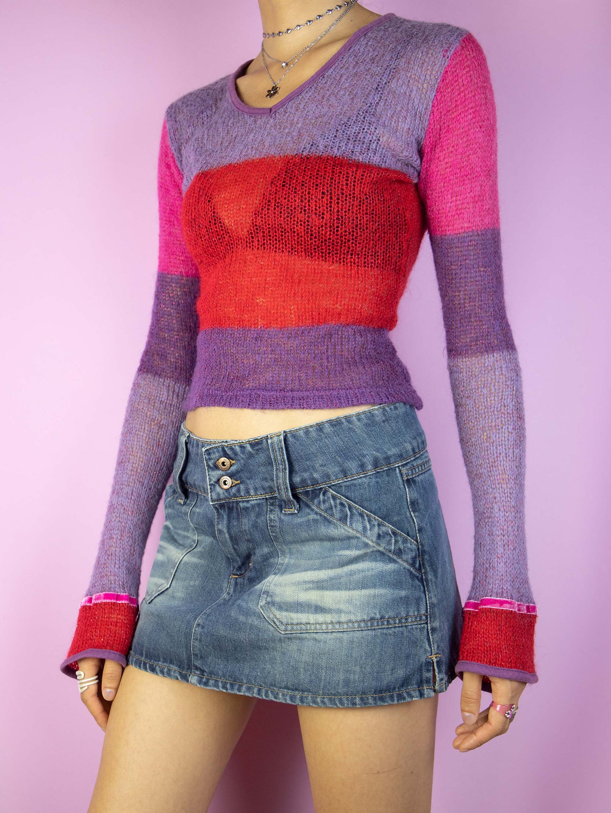 The Y2K Denim Low Rise Mini Skirt is a vintage 2000s cyber grunge low-waisted jean mini skirt with pockets.