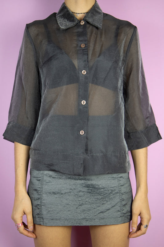 The Vintage 90s Dark Gray Sheer Blouse is a semi-transparent metallic gray shirt with half sleeves, collar, and buttons. Disco glam 1990s evening party night blouse.