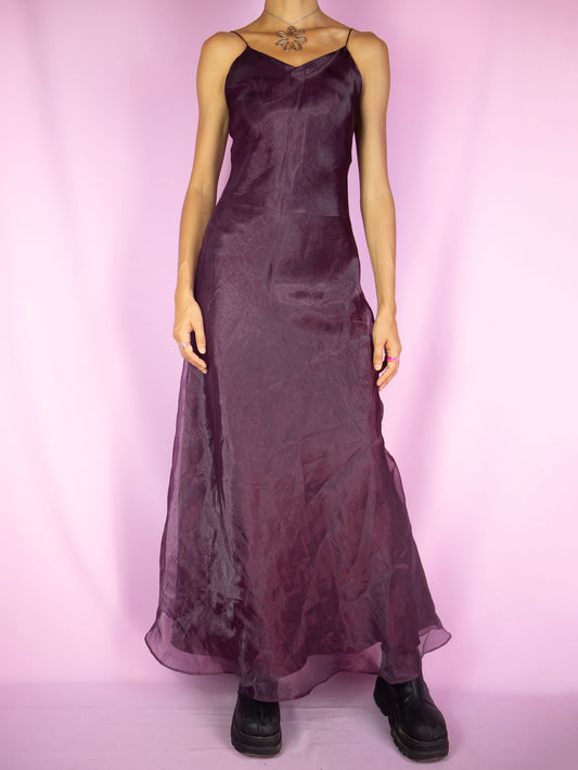 The Vintage 90s Dark Purple Maxi Dress is a purple sleeveless flared dress with spaghetti straps. Fairy grunge whimsygoth 1990s summer party night midi dress.