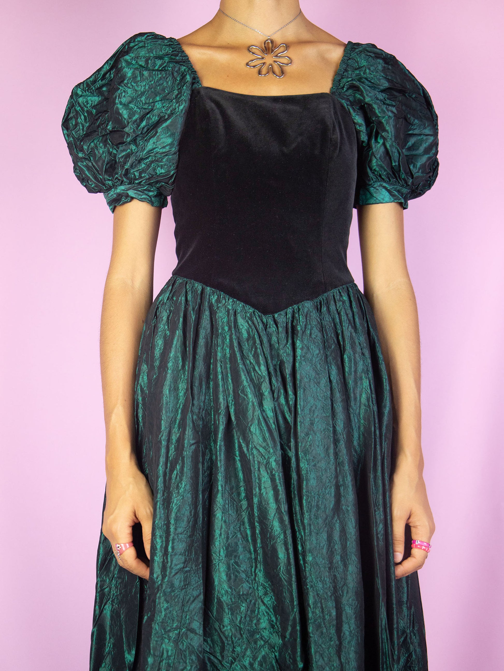 The Vintage 90s Puff Sleeve Midi Dress is an iridescent green flared dress with puff sleeves, black velvet front and back zipper closure. Cottage regency inspired 1990s dark romantic whimsygoth maxi dress.