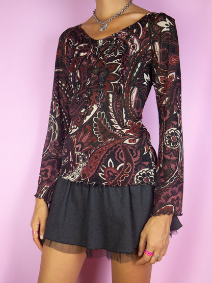 The Vintage Y2K Maroon Abstract Mesh Top is a burgundy beige and black abstract floral print long sleeve lettuce hem t-shirt. Lovely boho fairy grunge blouse circa 2000's.