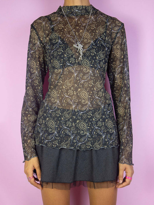 The Y2K Black Paisley Mesh Top is a vintage black brown and beige paisley floral print semi-sheer mesh long sleeve turtleneck shirt with lettuce hem. Boho fairy grunge 2000s graphic top.