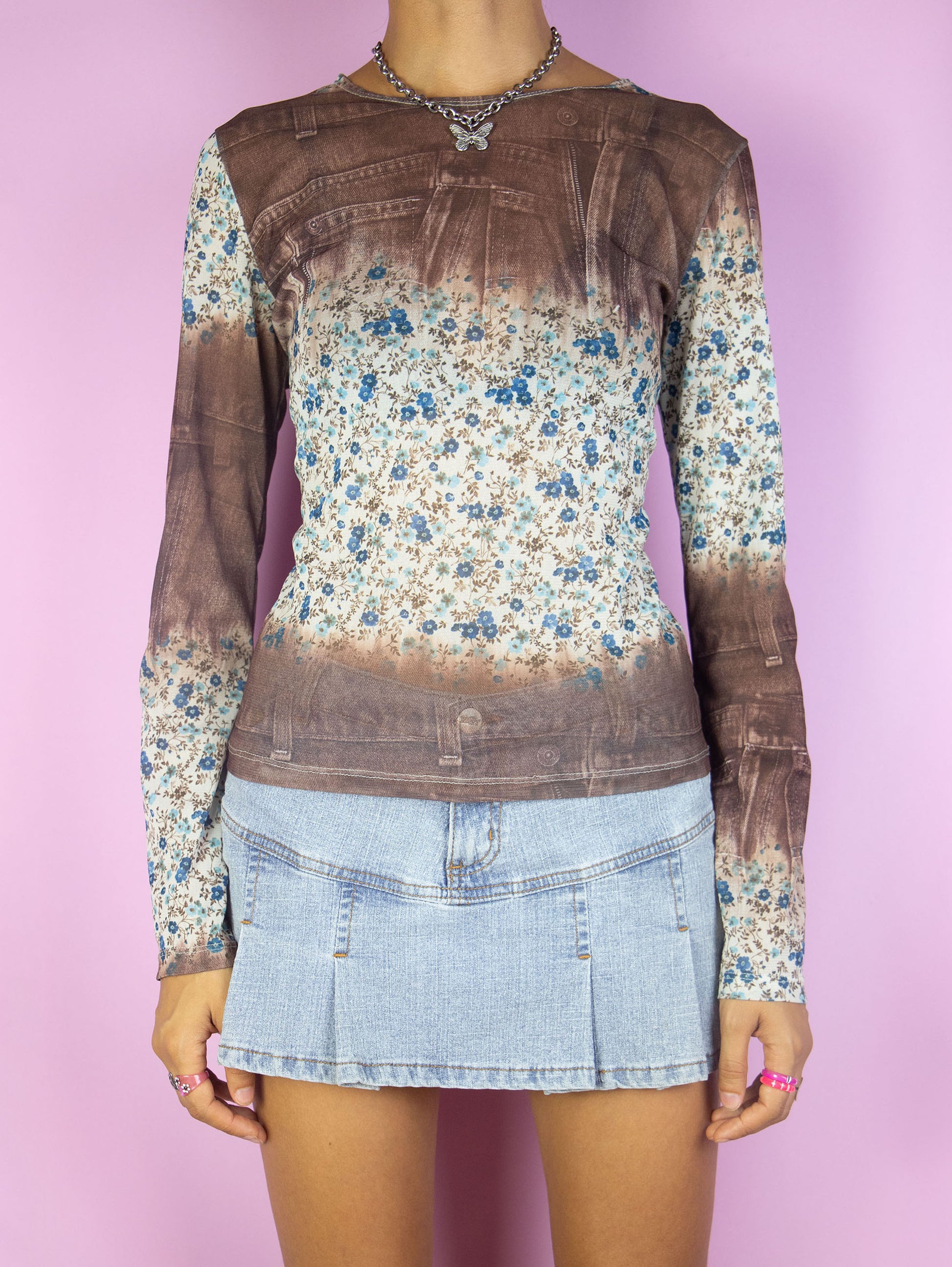 The Y2K Mesh Bell Sleeve Top is a vintage brown blue and white semi-sheer mesh floral abstract print bell sleeve shirt. Cyber fairy grunge 2000s graphic top.