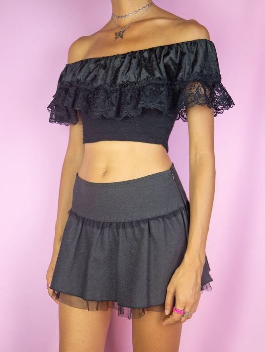 The Vintage 90s Black Off Shoulder Crop Top is a black off shoulder top with velvet and lace ruched ruffle detail. Fairy grunge whimsygoth 1990s summer party shirt.