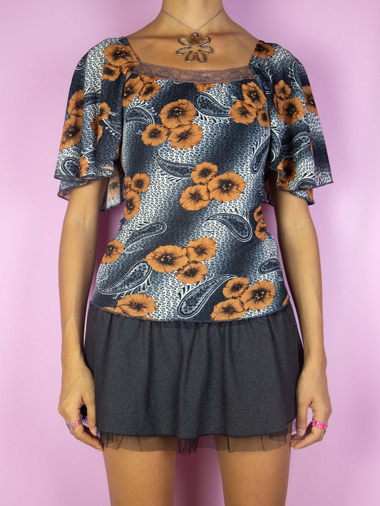 The Y2K Boho Graphic Mesh Top is a vintage gray brown and white abstract floral print mesh short sleeve top. Summer 2000s blouse.