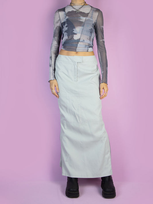 The Y2K Futuristic Gray Midi Skirt is a vintage light gray straight skirt with a front zipper closure and side slits featuring details of zippers. Cyber goth grunge 2000s gorpcore subversive maxi skirt.