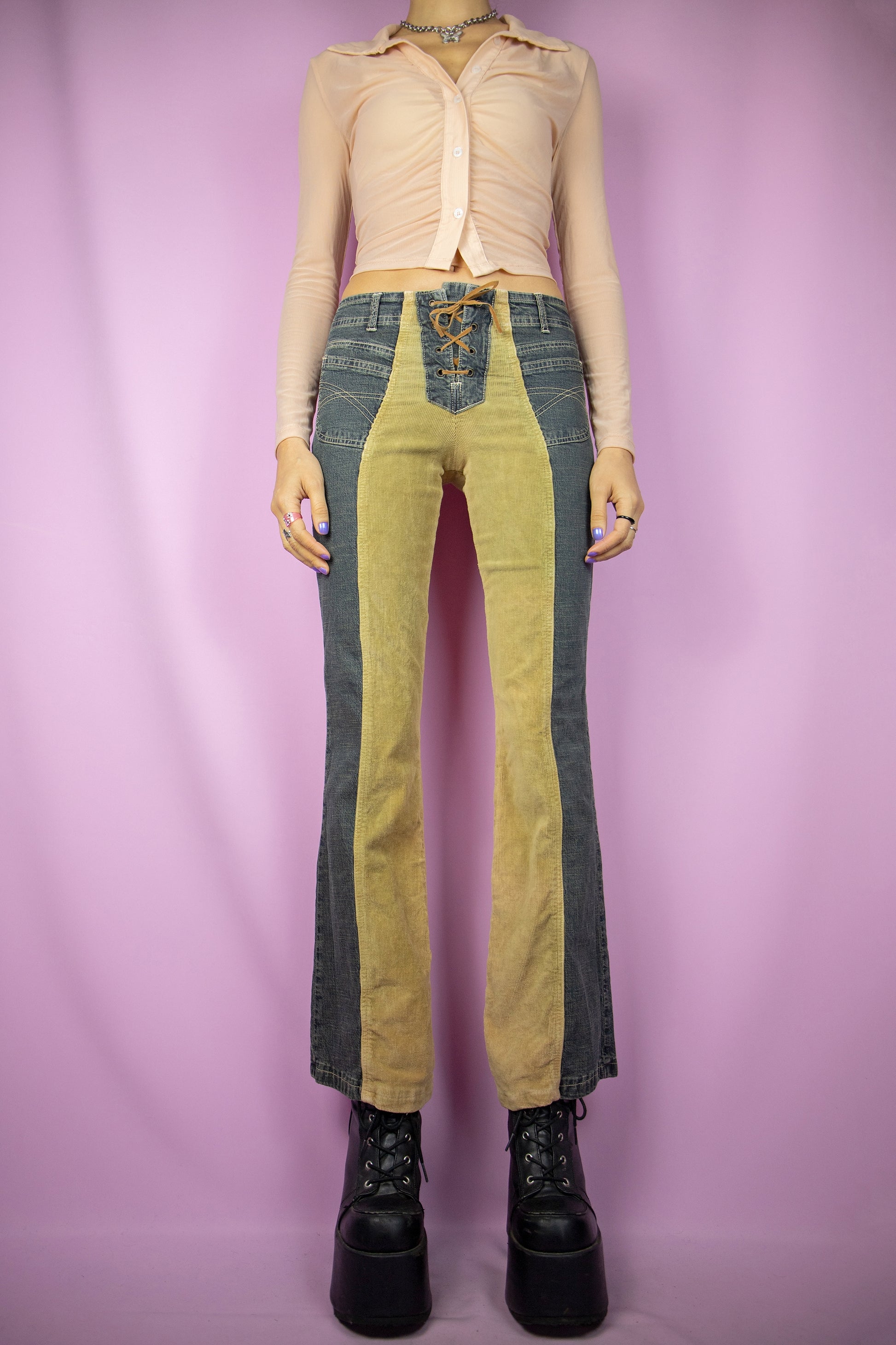 The Y2K Lace Up Flare Jeans are vintage 2000s country western inspired mid-rise half-denim and half-beige corduroy stretchy flared pants with pockets and a tie-front detail.