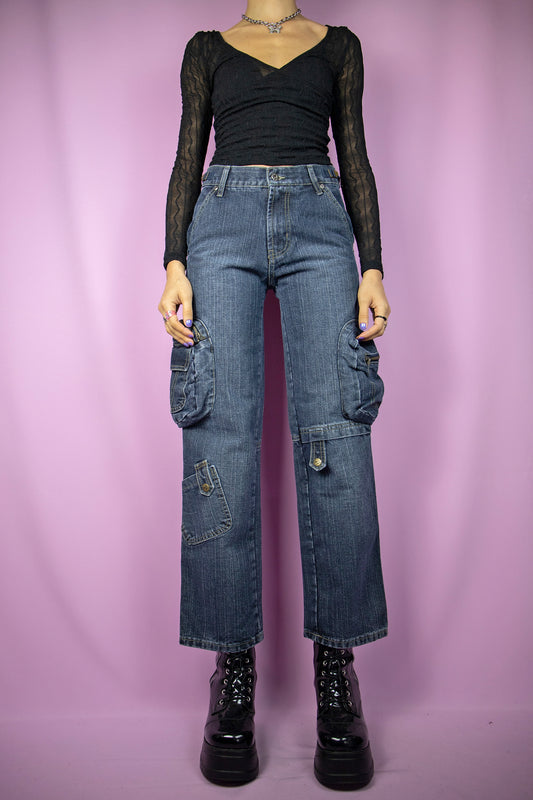 The Vintage Y2K Cargo Wide Jeans are high-waisted, cargo-style wide-leg pants with pockets. Embodying cyber goth grunge aesthetics, these millennium dark denim trousers capture the essence of the 2000s.
