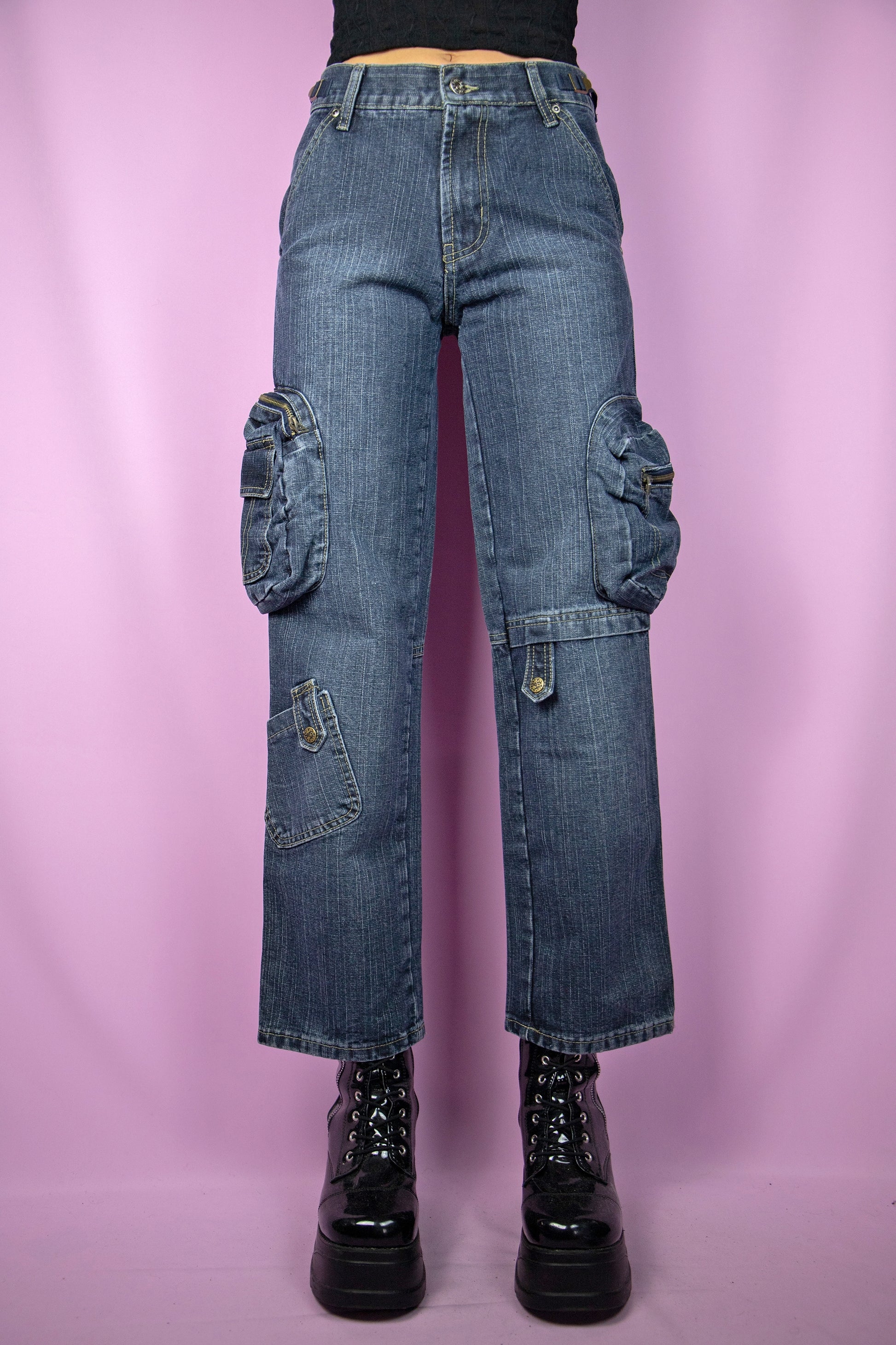 The Y2K Cargo Wide Jeans are vintage 2000s mid-rise utility dark denim pants with pockets.