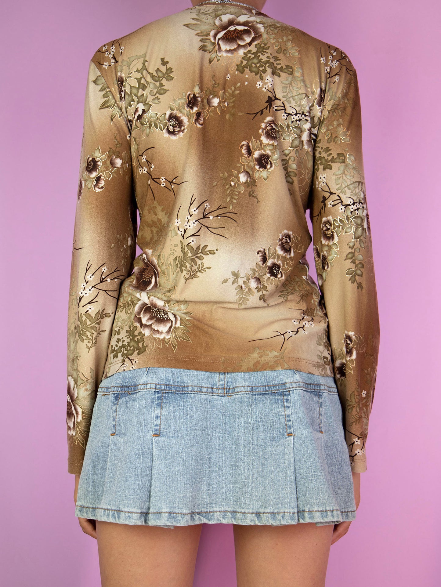 The Y2K Brown Floral Wrap Top is a vintage shirt wrapped and tied on one side. Boho fairy 2000s blouse.