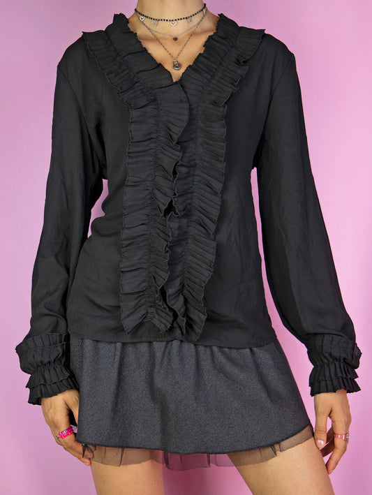 The Y2K Black Ruffle Blouse is a vintage semi-sheer black balloon sleeve top with ruffles. Dark romantic whimsygoth 2000s shirt.