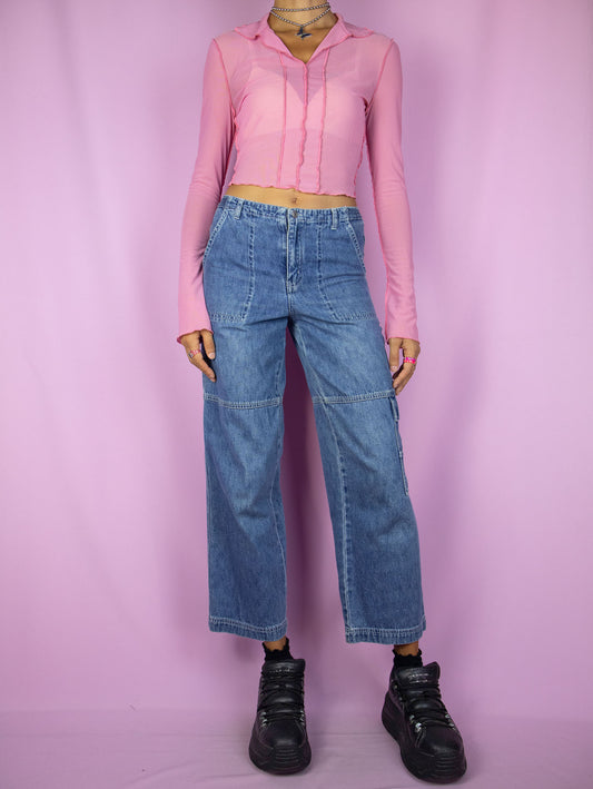 The Y2K Wide Ankle Jeans are vintage wide-legged ankle-length jeans with a mid-rise and pockets. Super cute gorpcore grunge cargo style cropped pants from the 2000s.