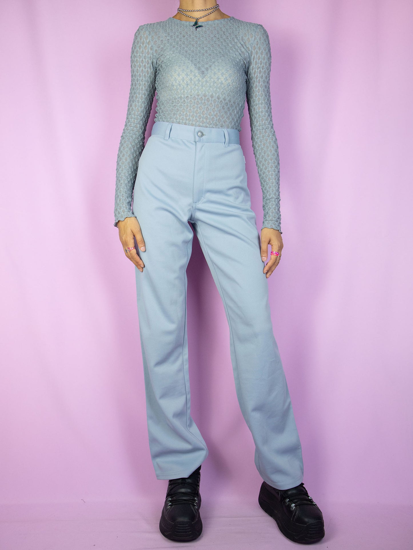 The Y2K Gray Pleated Straight Pants are vintage high-waisted straight-leg trousers in a blue-gray hue, featuring pleats and a front zipper closure. These pants offer a casual and classic retro office style from the 2000s.