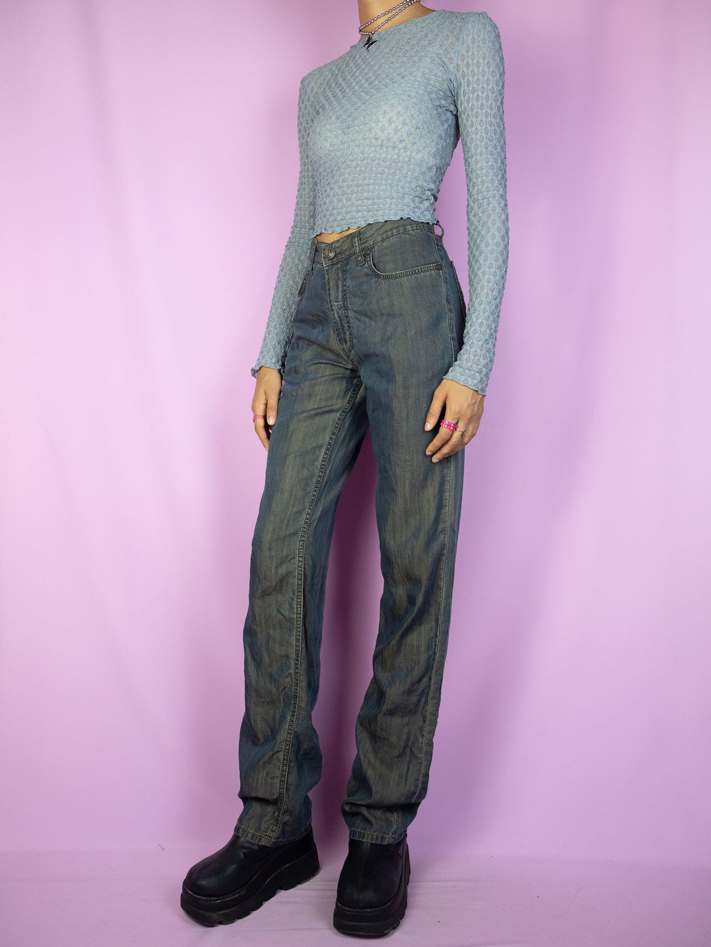 The Y2K Dark Rusty Straight Jeans are vintage 2000s high-waisted pants with a dark rusted blue effect, featuring pockets and a front zipper closure.