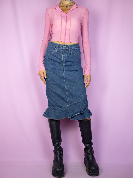 The Y2K Ruffle Denim Midi Skirt is a vintage denim skirt with a ruffled hem, back slit, and pockets. Gorgeous cyber coquette jean skirt from the 2000s.
