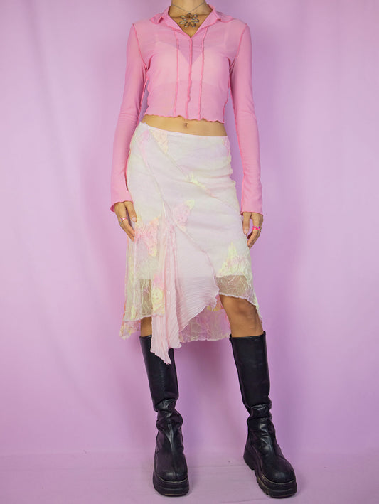 The Y2K Fairy Pink Midi Skirt is a vintage pastel pink, yellow, and orange tie-dye mesh skirt with floral details, an asymmetric hem, and an elastic waistband. A stunning avant-garde romantic coquette-style skirt from the 2000s.