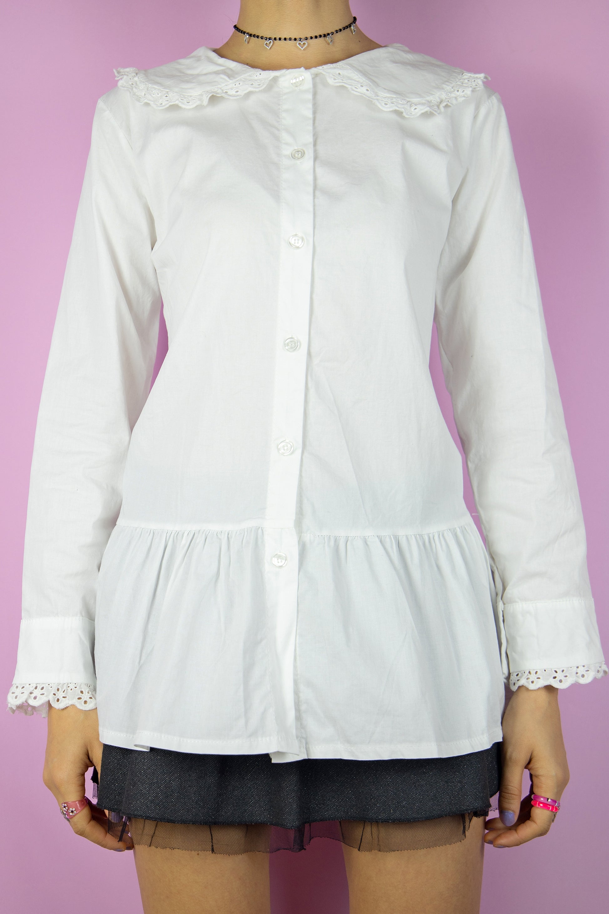 The Y2K White Big Collar Blouse is a vintage oversized collar shirt with buttons, ruffle hem, and lace trim. Cottage prairie 2000s preppy office coquette blouse.