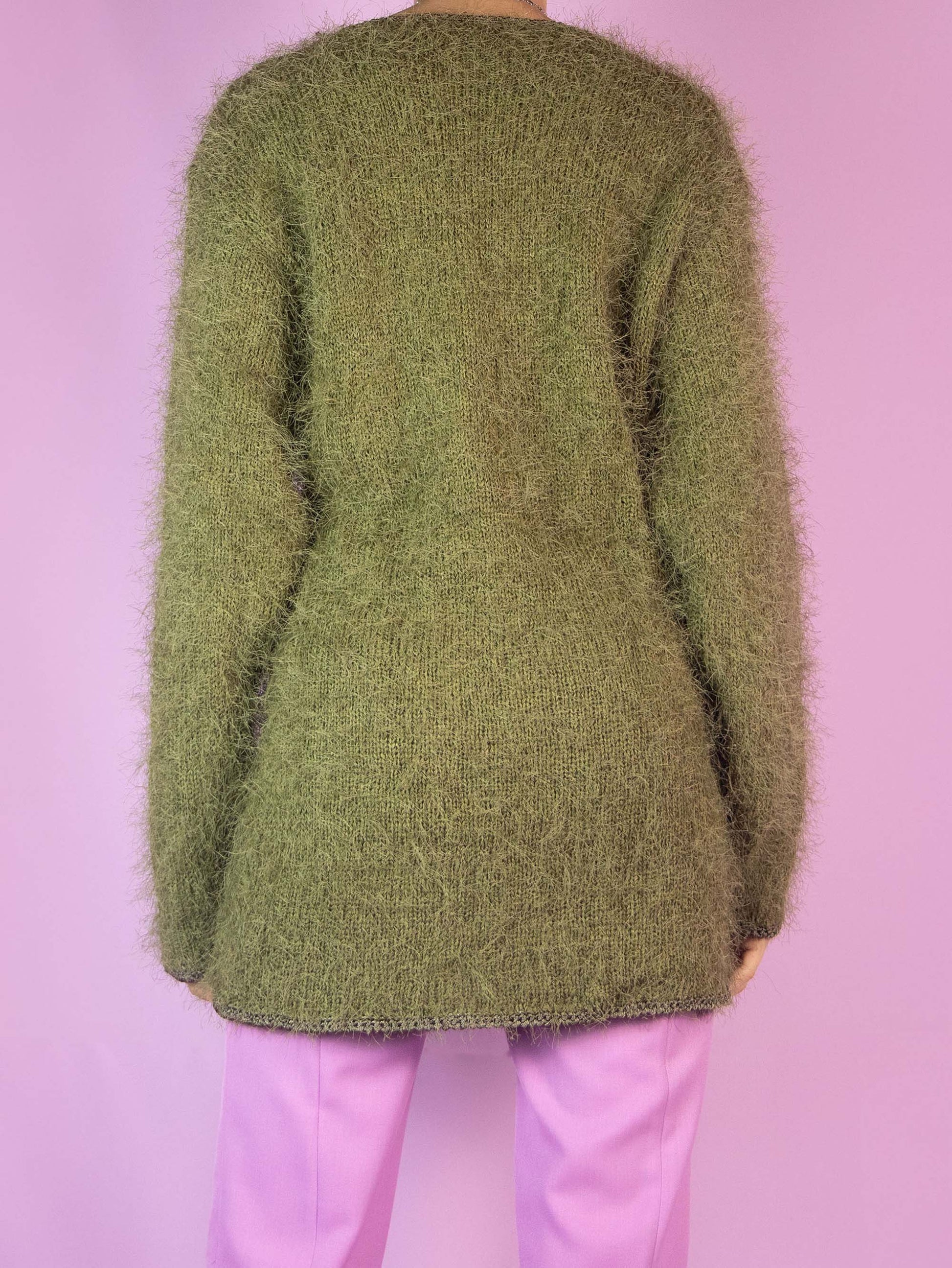 The Vintage 90s Green Hairy Knit Sweater is a khaki pullover with abstract purple details. Boho retro 1990s knitted jumper.