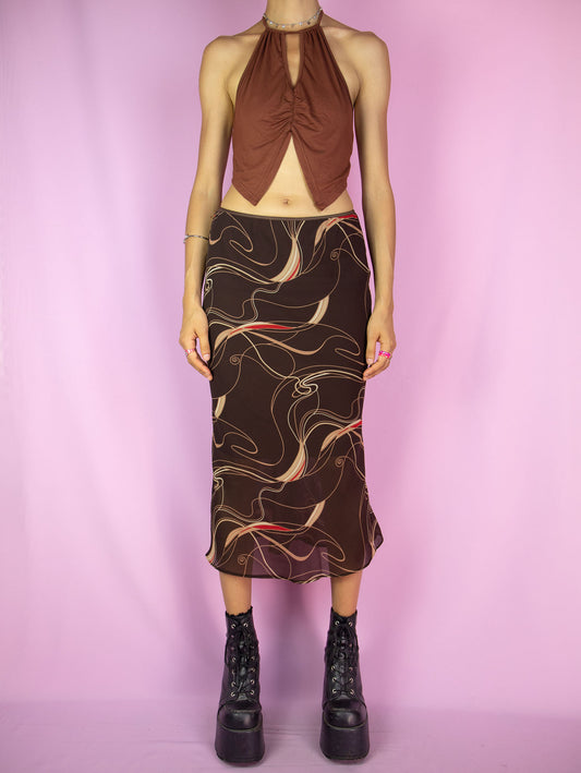 The Vintage 90s Boho Brown Midi Skirt is a striped abstract printed skirt with an elasticated waist. Cyber fairy grunge 1990s summer midi skirt.