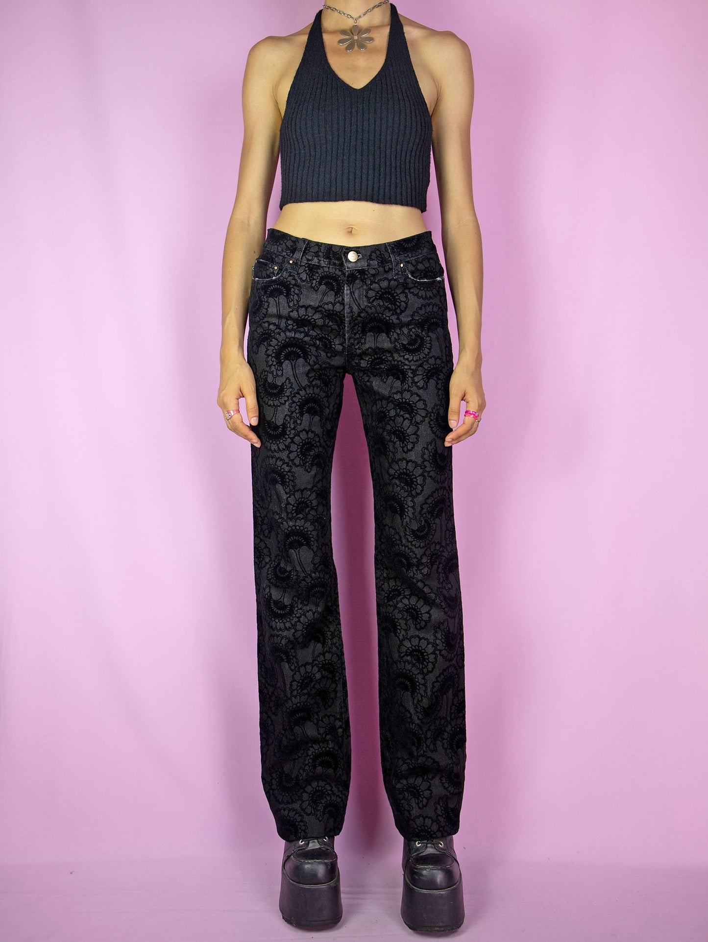 The Y2K Cavalli Black Straight Jeans are vintage 2000s mid-rise straight-leg pants, slightly stretchy adorned with floral velvet details by italian designer Roberto Cavalli. Excellent vintage condition.