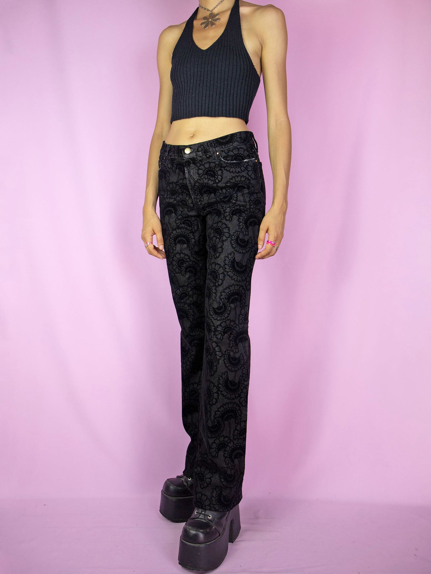 The Y2K Cavalli Black Straight Jeans are vintage 2000s mid-rise straight-leg pants, slightly stretchy adorned with floral velvet details by italian designer Roberto Cavalli. Excellent vintage condition.