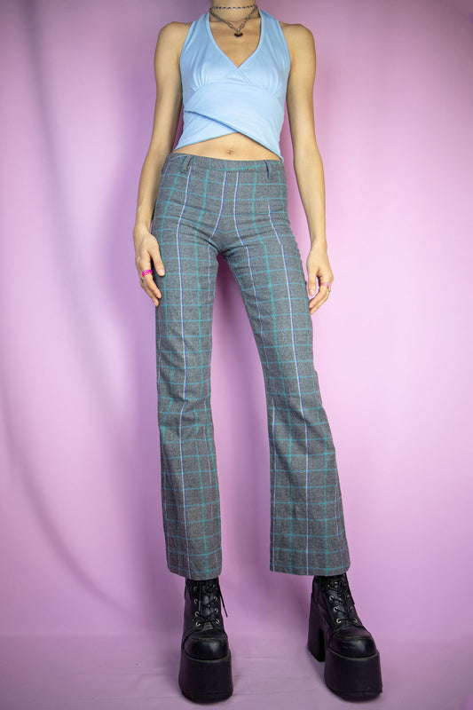 The Y2K Gray Plaid Flare Pants are vintage checkered pattern pants with a side zipper closure. Preppy office 2000s knit trousers.