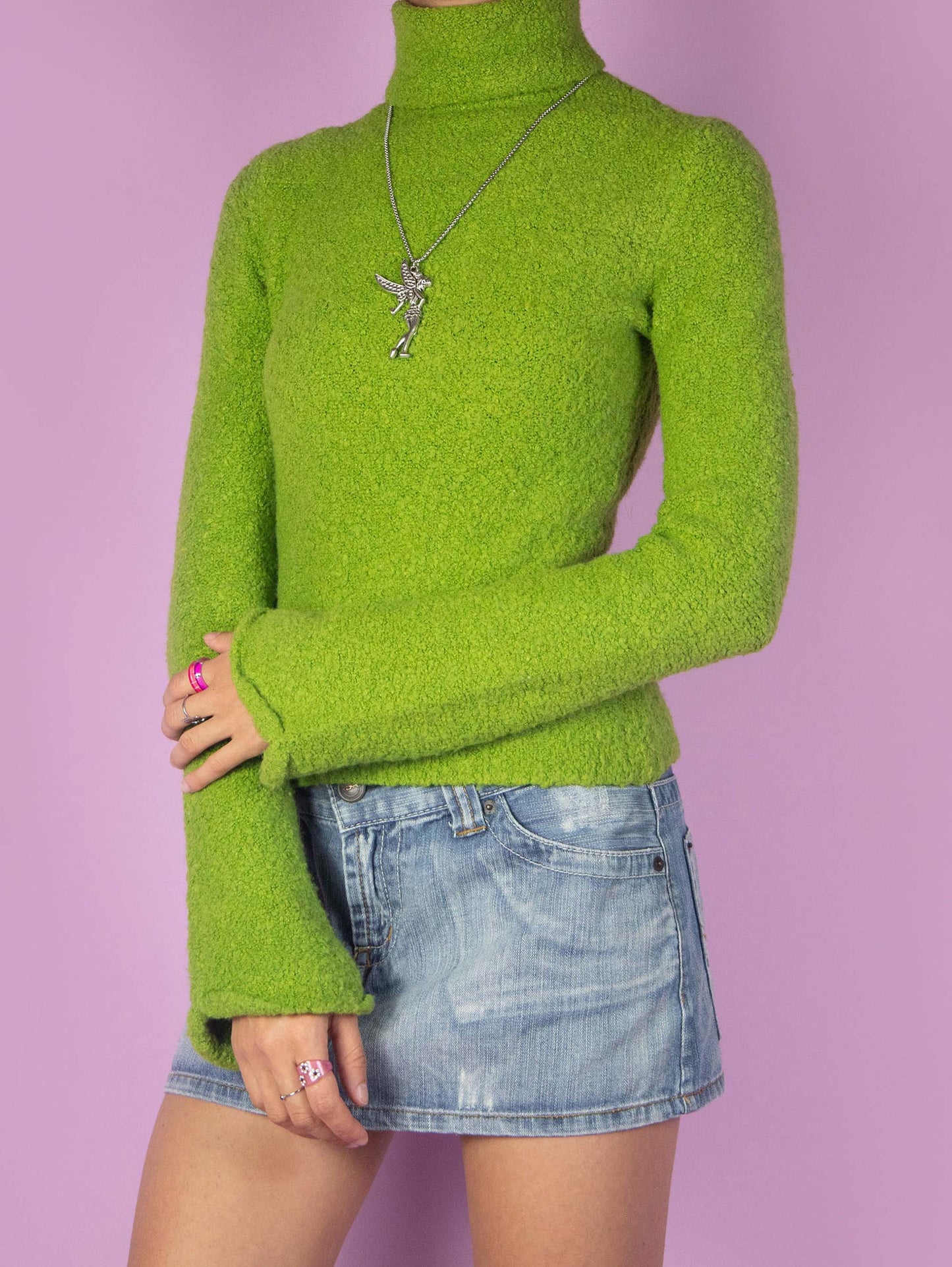 The Y2K Green Turtleneck Knit Sweater is a vintage sweater with slightly flared sleeves. Cyber fairy grunge 2000s pullover.