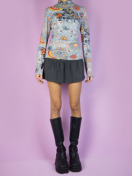 The Y2K Gray Graphic Turtleneck Top is a vintage 2000s long-sleeve shirt with a multicolored abstract print.