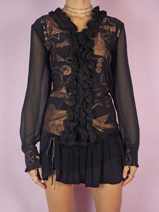 The Vintage 90s Black Ruffle Frill Top is an avant-garde, extravagant, glam style party blouse featuring a shiny metallic bronze and copper abstract painted pattern, buttons, and a V-neckline.