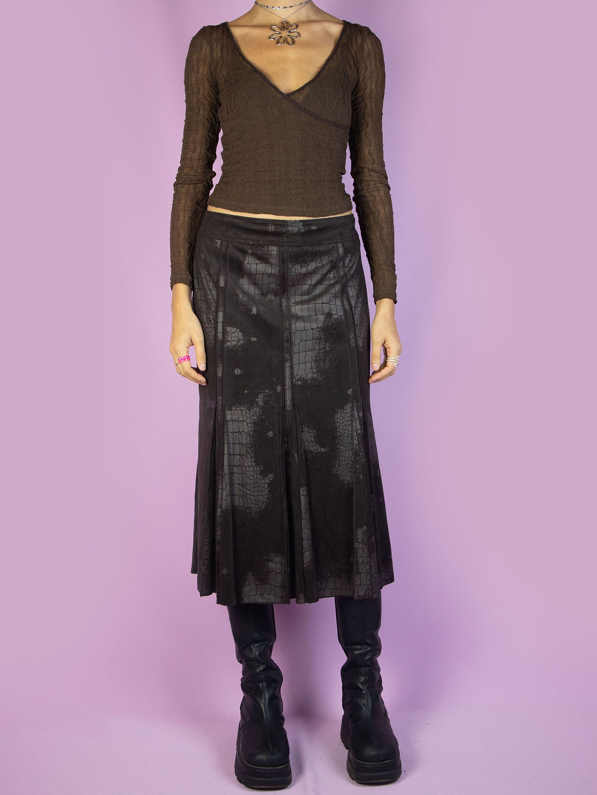 The Y2K Dark Brown Midi Skirt is a vintage flared faux suede skirt with animal pattern details and a side zipper closure. Gorgeous fairy grunge whimsygoth style 2000s boho skirt. 