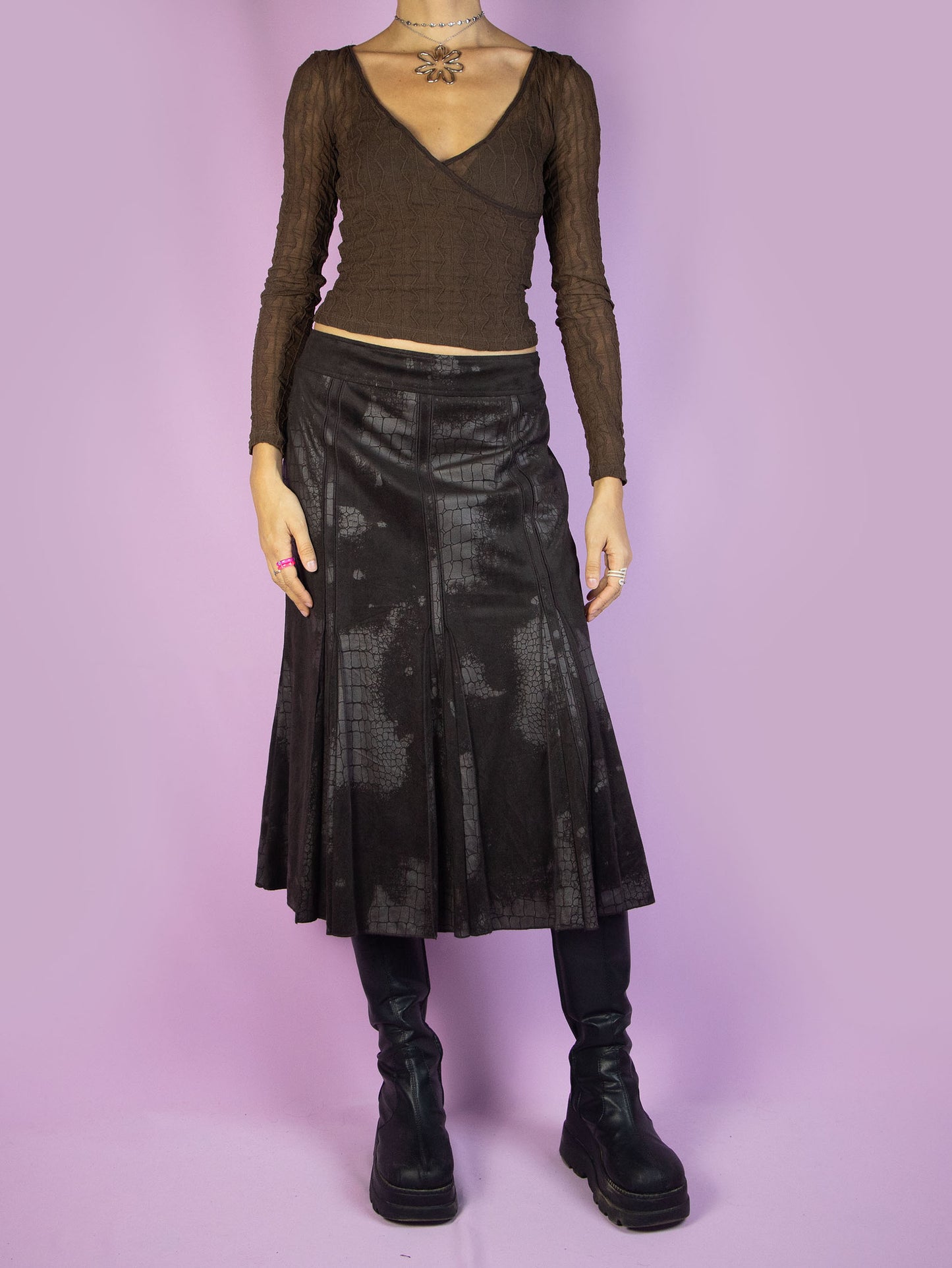The Y2K Dark Brown Midi Skirt is a vintage flared faux suede skirt with animal pattern details and a side zipper closure. Gorgeous fairy grunge whimsygoth style 2000s boho skirt. 