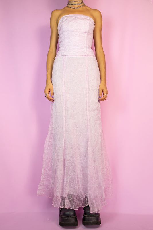 The Vintage 90s Lilac Strapless Maxi Dress is a semi-sheer pastel purple dress with side zipper closure. Romantic 1990s party night midi dress.