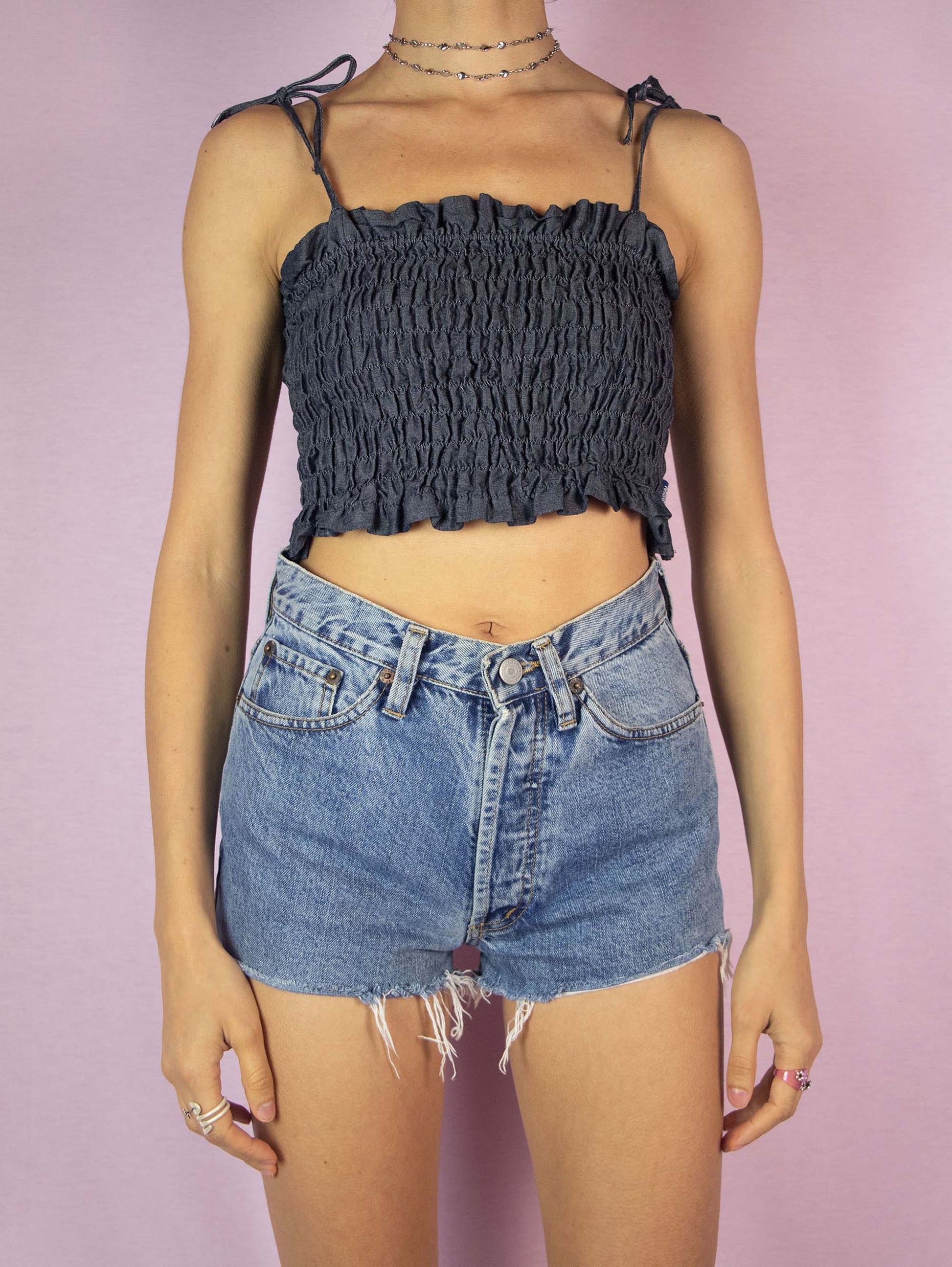 The Y2K Denim Shirred Crop Top is a vintage 2000s summer beach blue ruched top with tie straps.