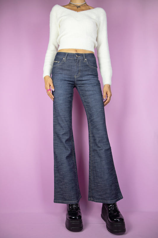 The Vintage Y2K Dark Denim Flare Jeans are stylish flared wide pants with pockets, embodying super cute millennium cyber grunge vibes from the 2000s.